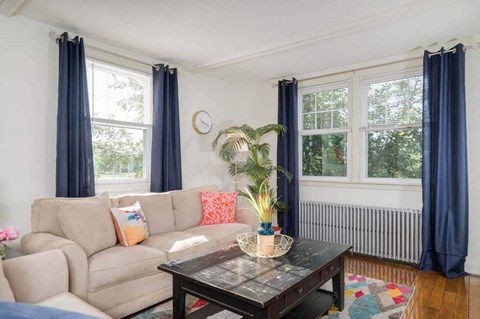 a living room with a couch and a coffee table