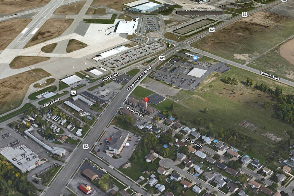 a map of a city with a road and buildings