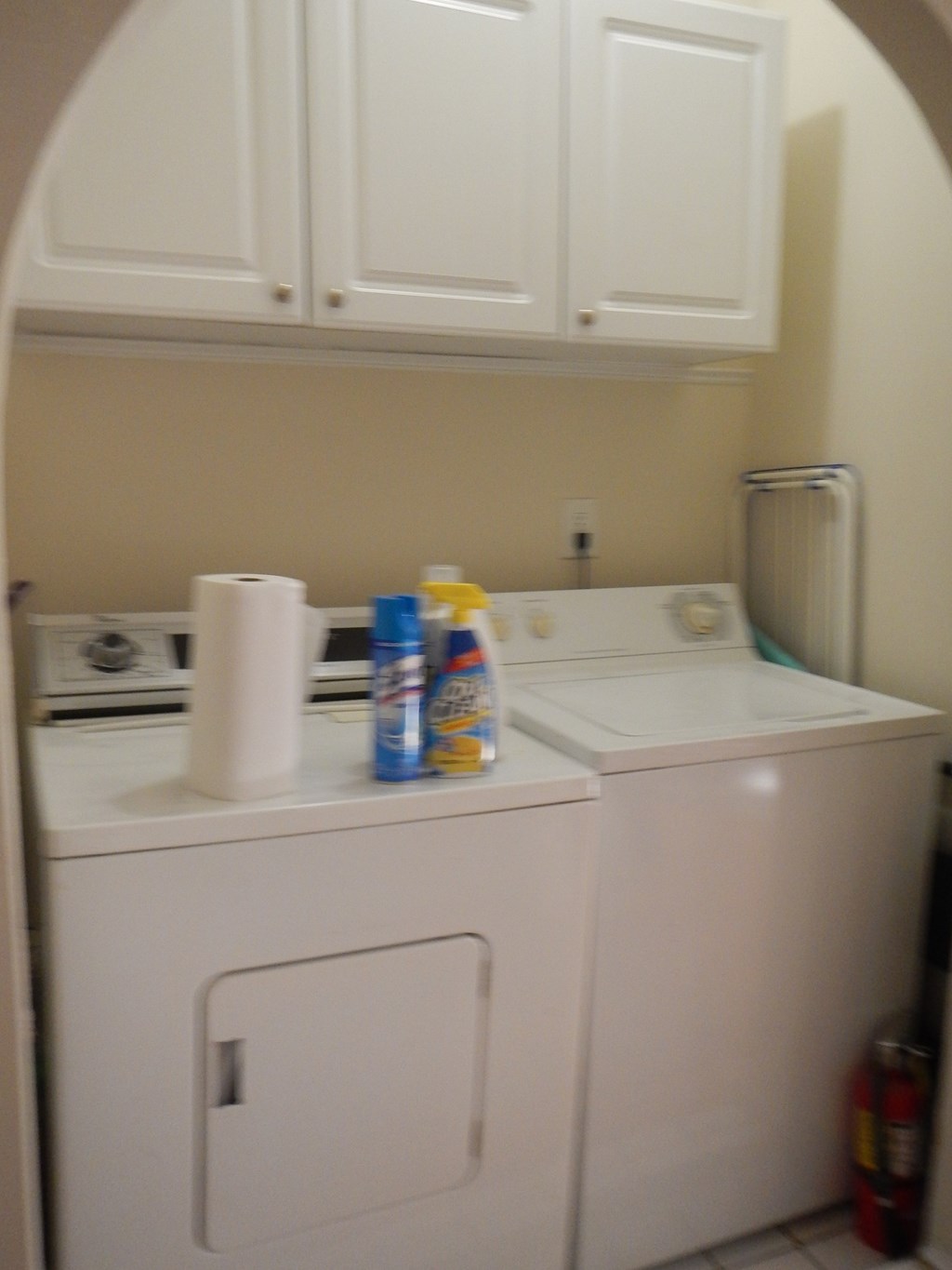 a small kitchen with a stove and a sink