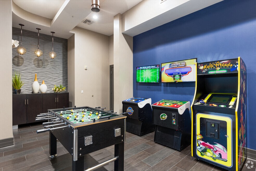 a games room with arcade games and video games