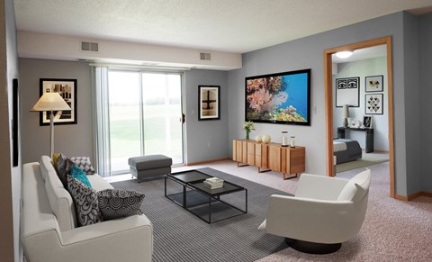 A living room with a white sofa, a black coffee table, and a large painting on the wall.