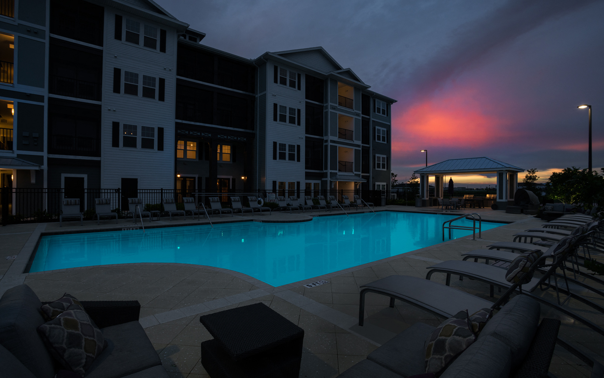 Swimming Pool at Dusk at Palms at Magnolia Park in Riverview, FL