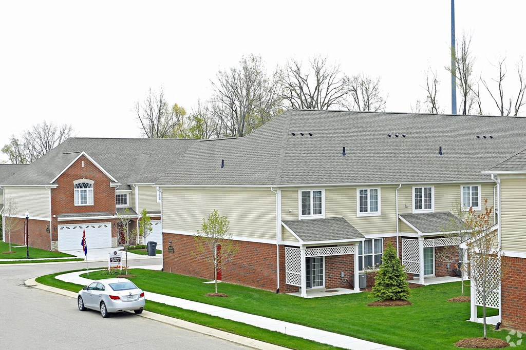 a house with a car parked in front of it