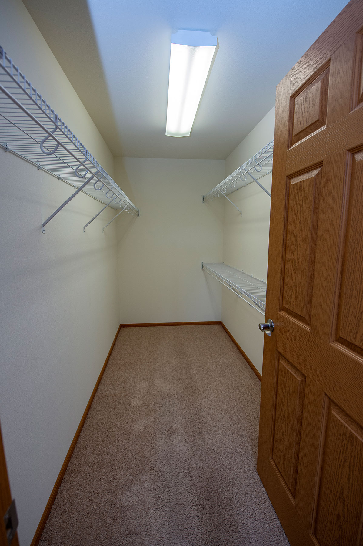 a room with a closet and a door