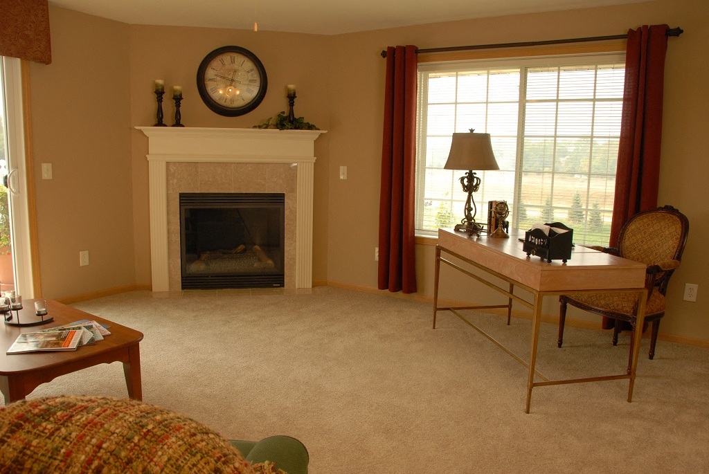 Living Rooms With Fireplace at Wildwood Highlands Apartments & Townhomes 55+, Menomonee Falls, WI,53051