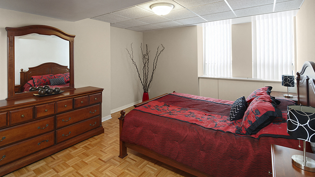 Bedroom with Dresser and Mirror and Queen Bedset