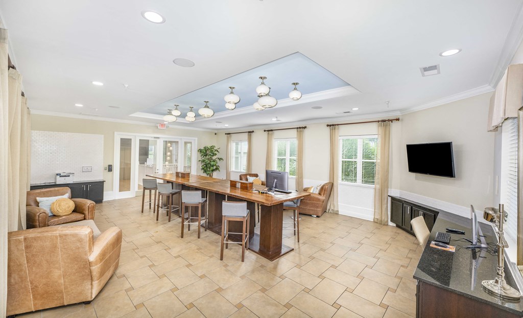 a conference room with a table and chairs and a fireplace