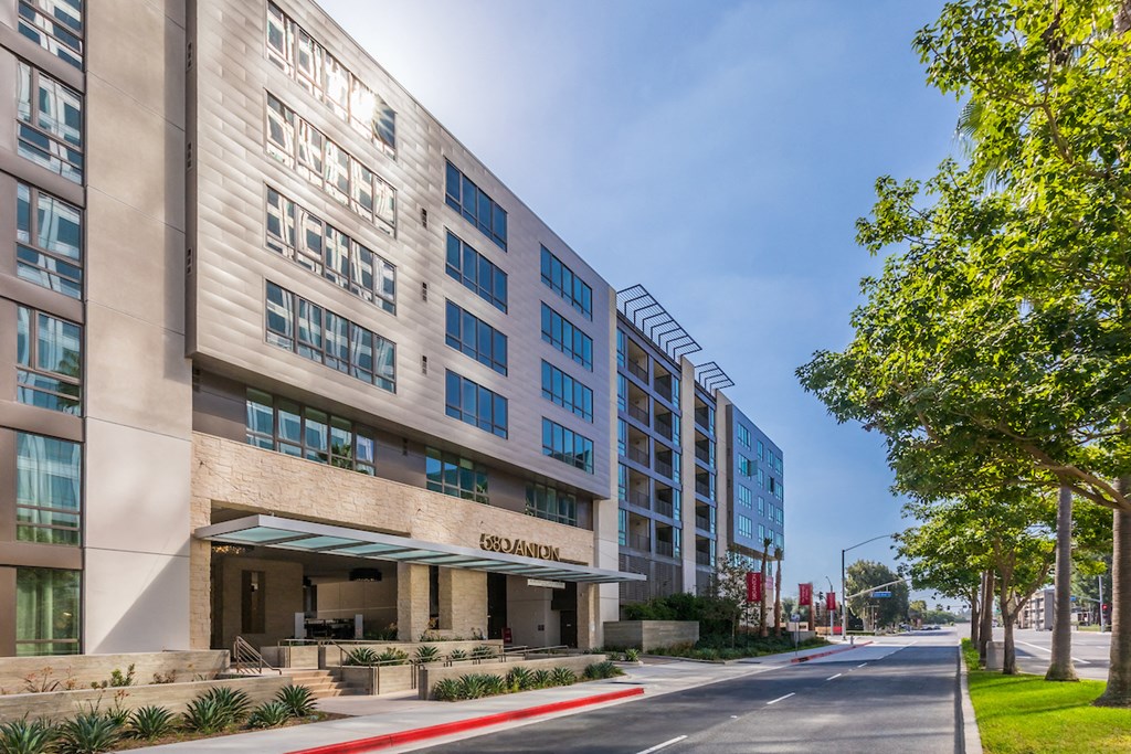 a large building with a street in front of it