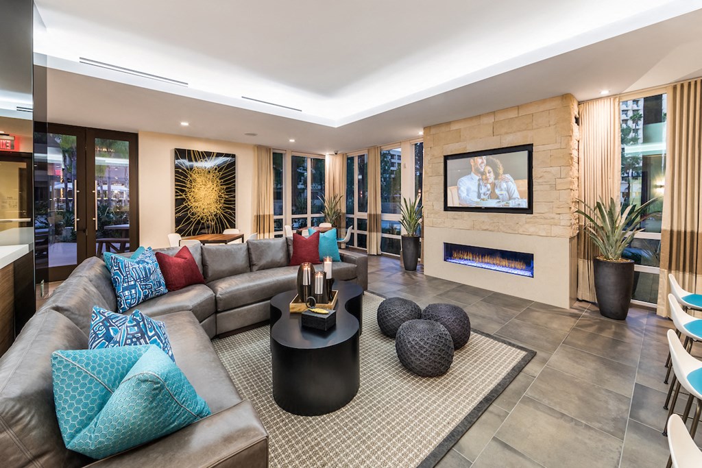 a living room with a couch and a fireplace
