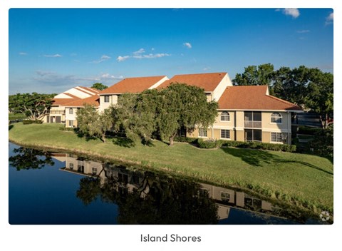 a rendering of a building next to a body of water
