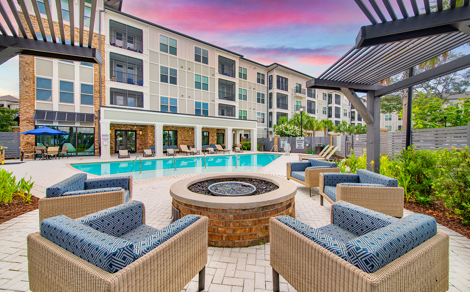 our apartments offer a pool and lounge area with a fire pit