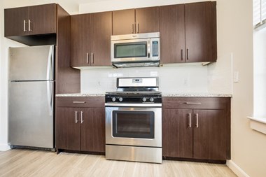 Fully Equipped Kitchen Includes Frost-Free Refrigerator, Electric Range, & Dishwasher at East Main, Massachusetts - Photo Gallery 3