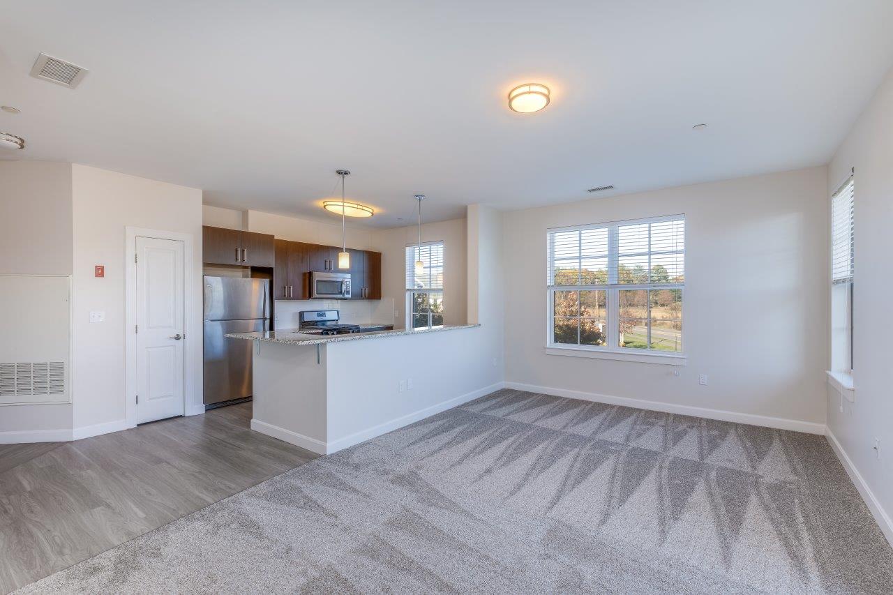 Carpeted Living Area at East Main, Norton