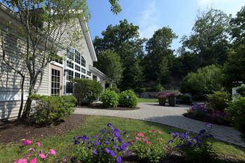 Property Surrounded By Greenery And Plant at Cumberland Crossing in Rhode Island 02864