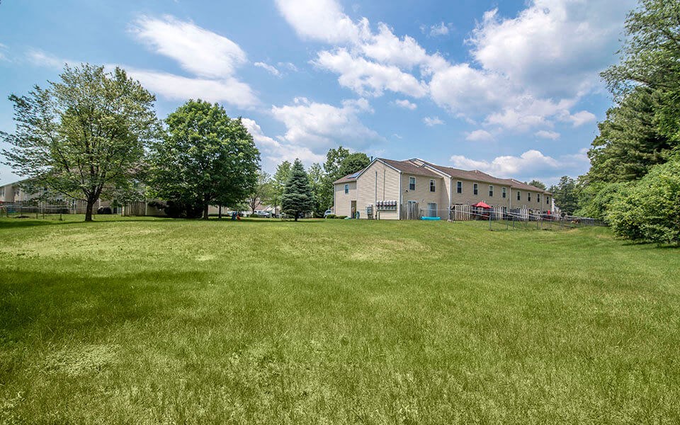 a large yard in front of a house