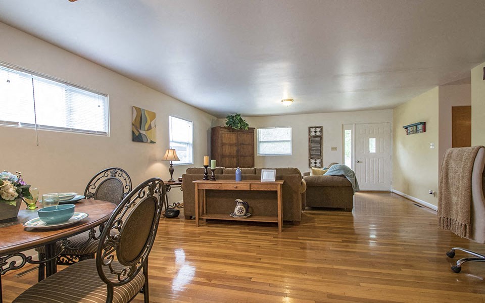 a living room with a couch and a table