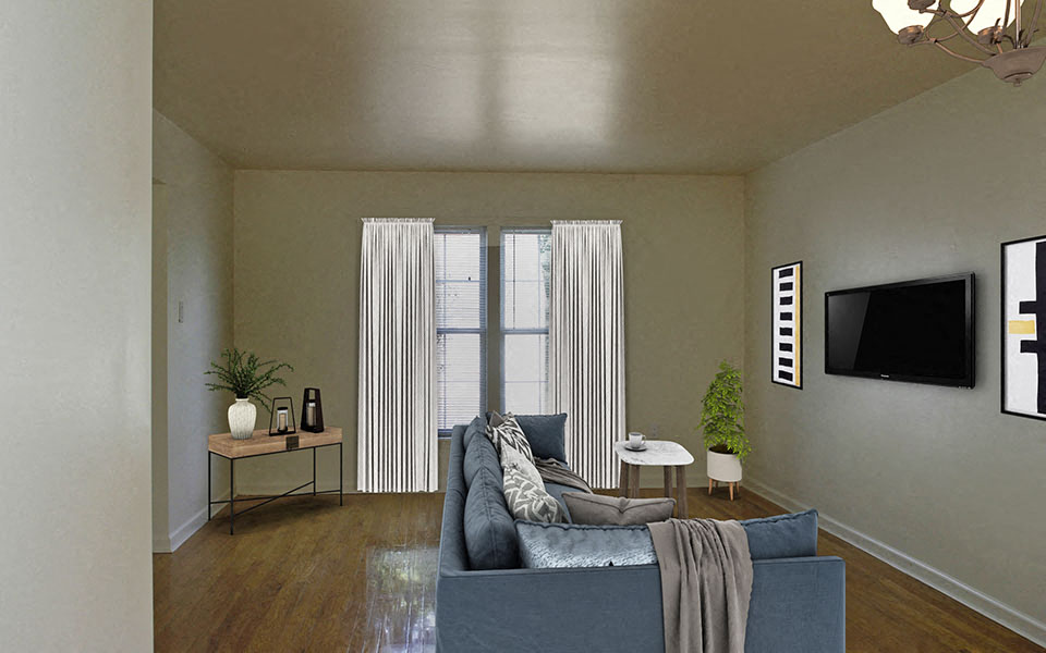 a living room with a couch and a tv