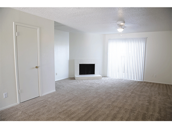 Spacious Living Room With Carpet at Hawthorne House, Midland, TX