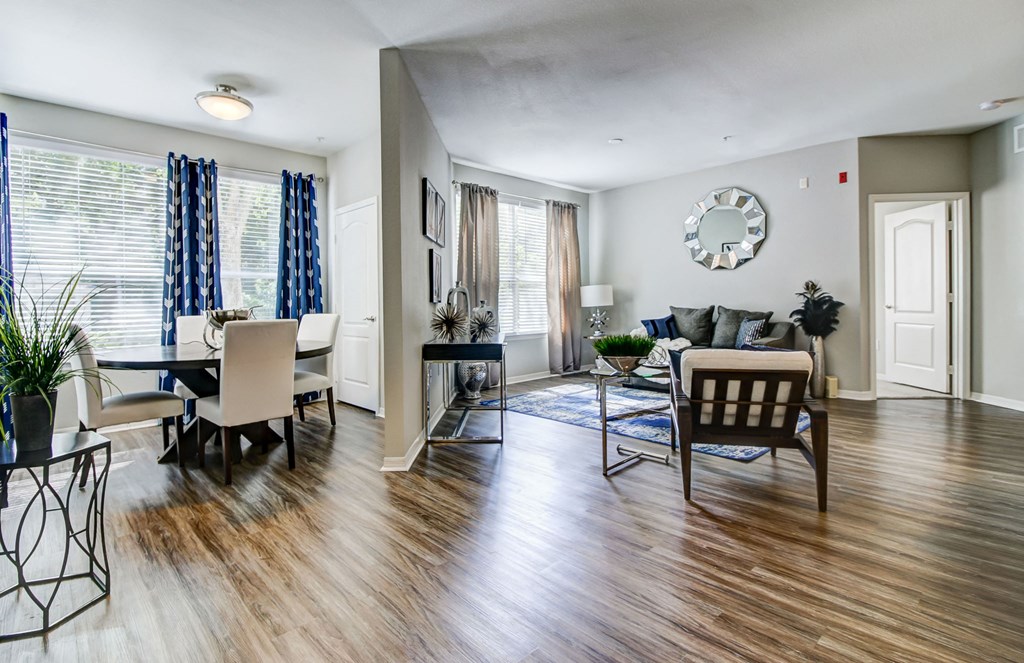 Sofa, Dinning Table in Living Room at Tuscany Bay Apartments, Tampa, FL, 33626
