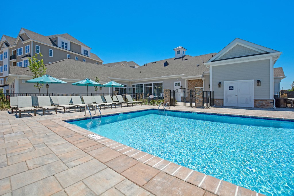 our apartments offer a swimming pool with umbrellas