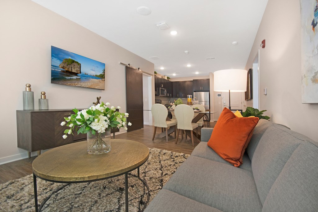 a living room with a couch and a table