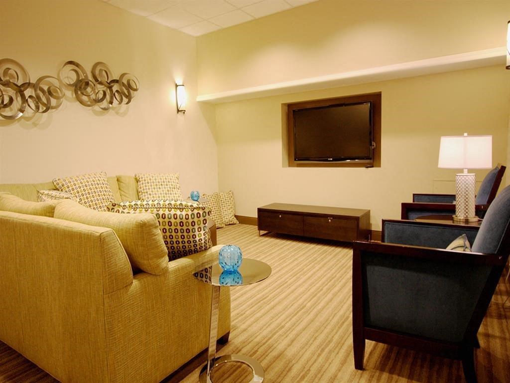 a living room with a couch and a television