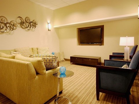 a living room with a couch and a television