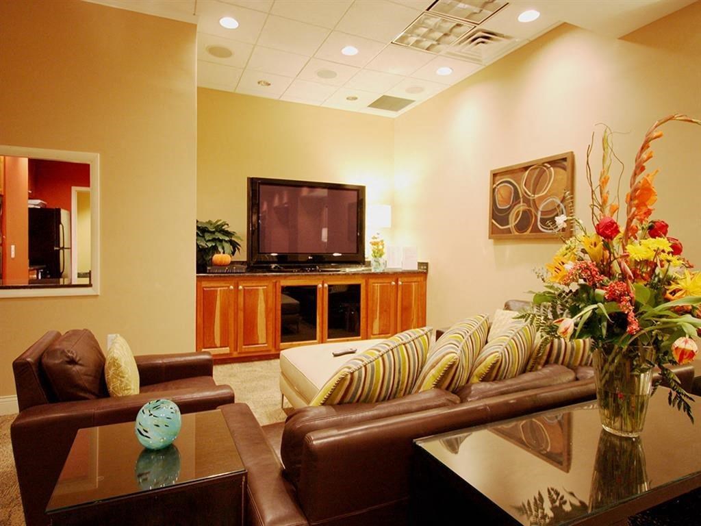 a living room with a couch and a television