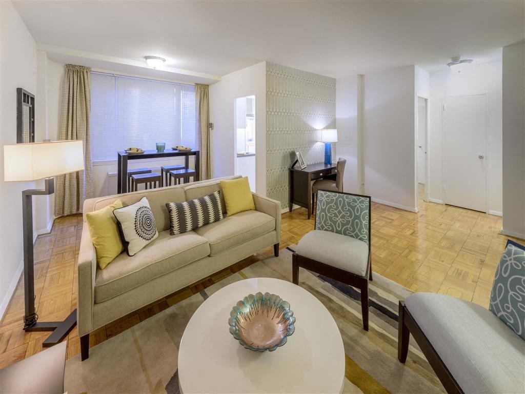 a living room with a couch and a table