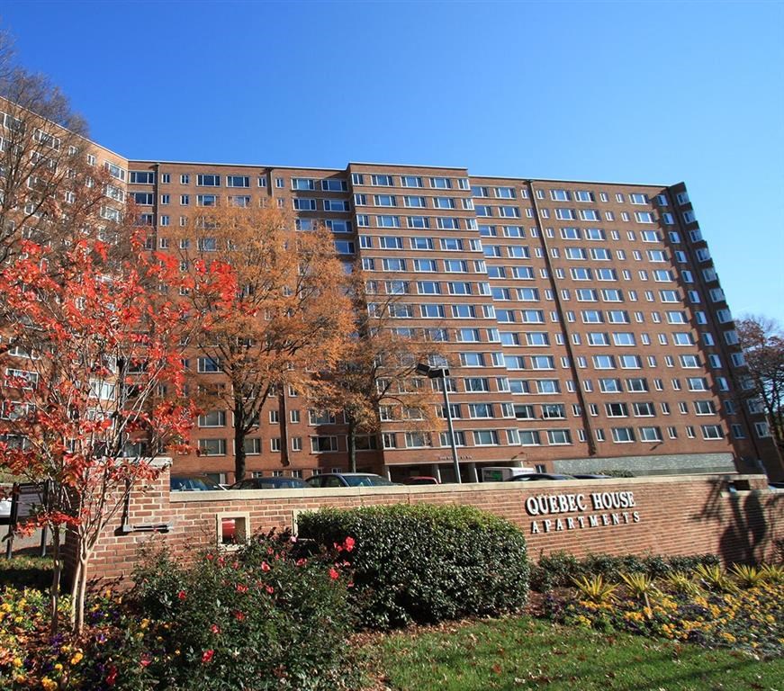 a large building with a sign in front of it