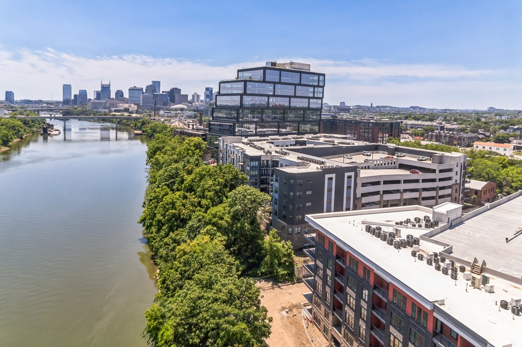 an aerial view of the city and the river