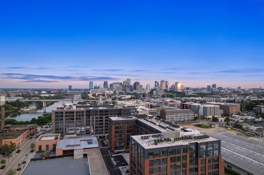 an aerial view of the city with the skyline in the background