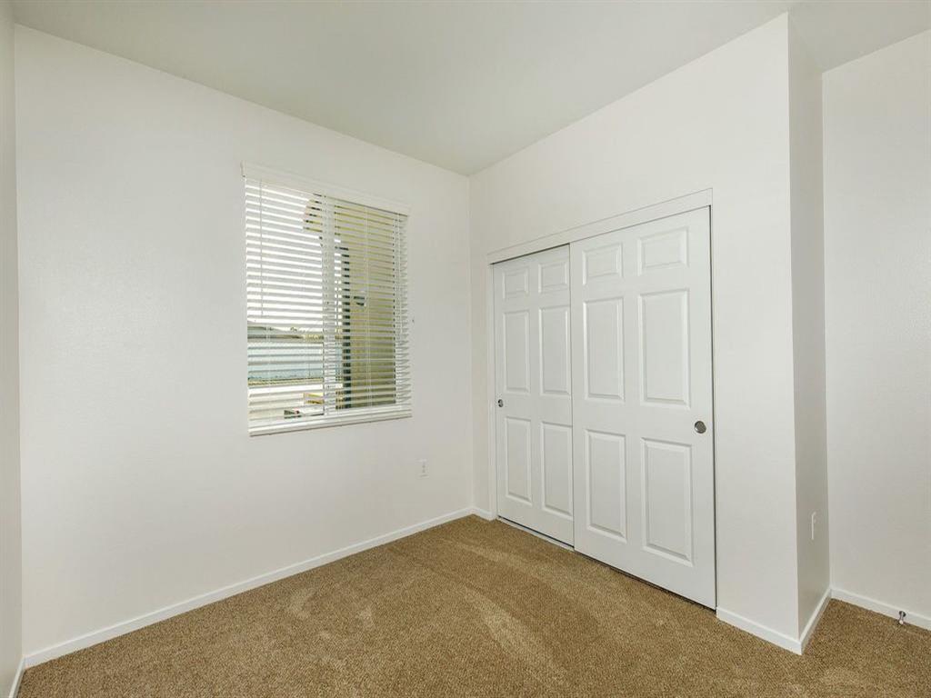 2nd bedroom comes with a window and sliding door closet