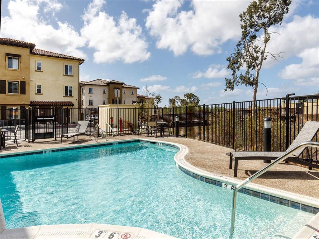 Pool area with chairs around to sit