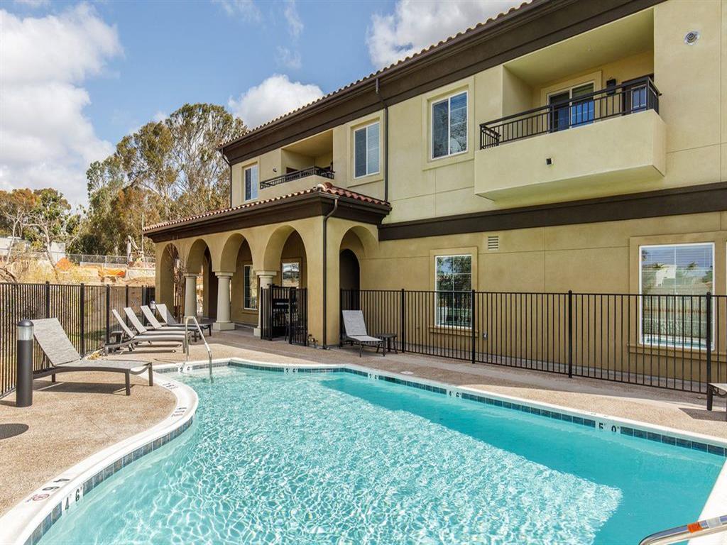 Pool with a gate to access showers and bathrooms