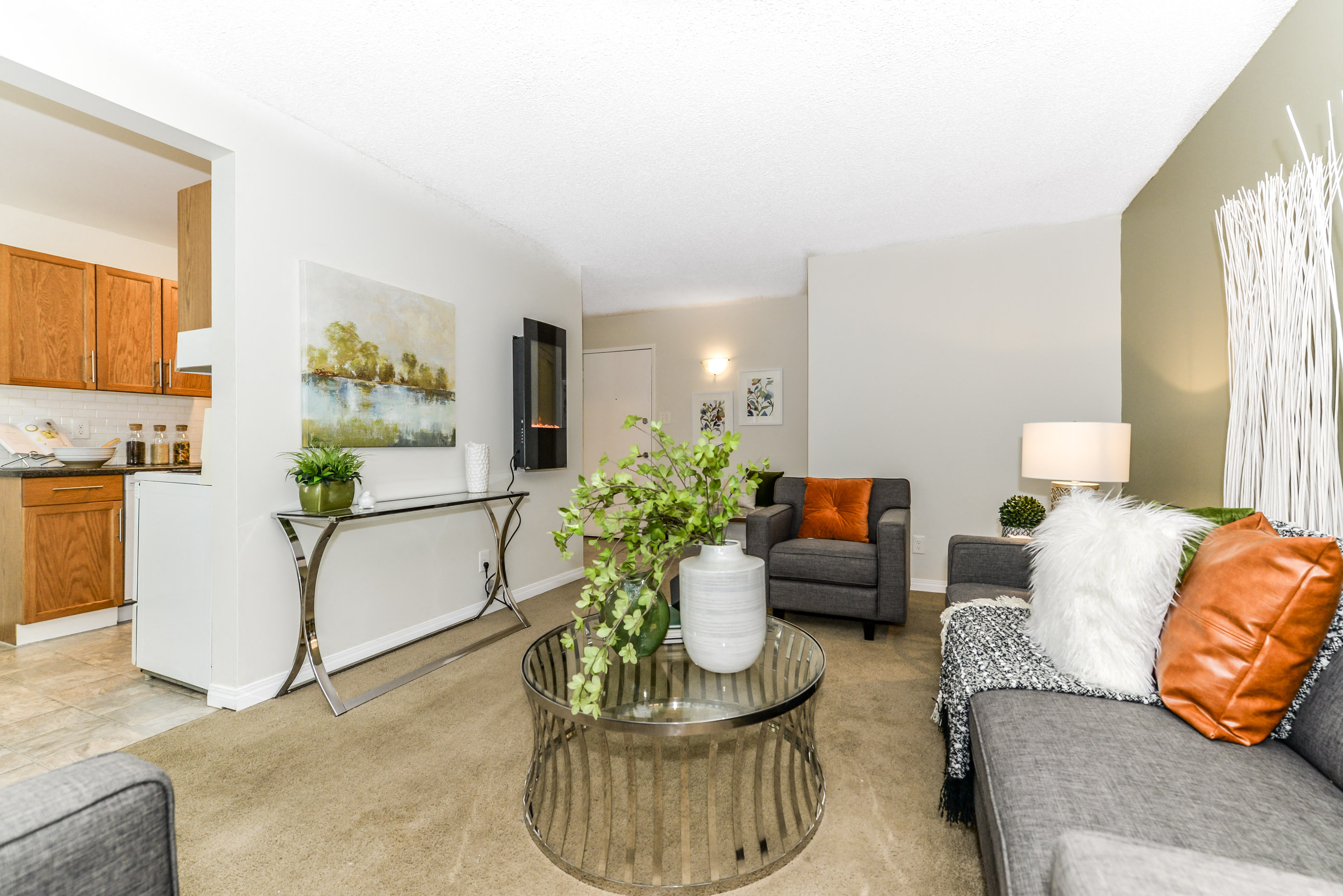 a living room with couches and a coffee table