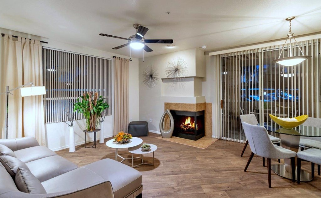 a living room with a couch and a fireplace