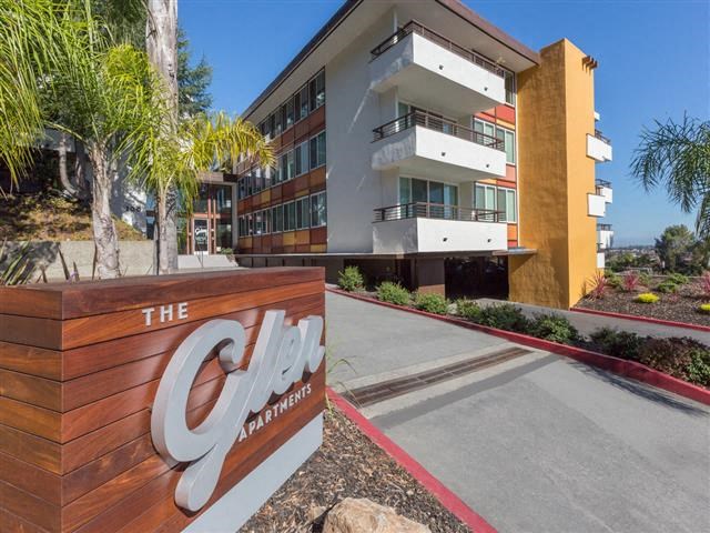 a sign in front of a building