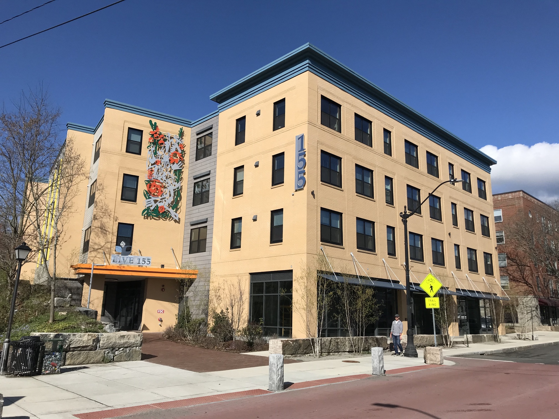 a large building with a mural on the side of it