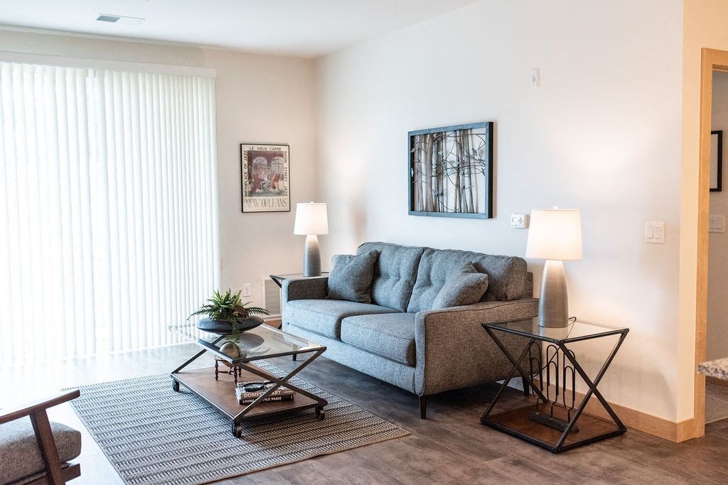 a living room with a couch and a table