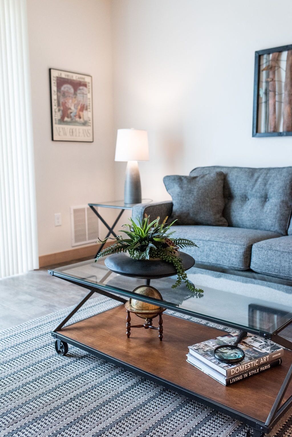a living room with a coffee table and a couch