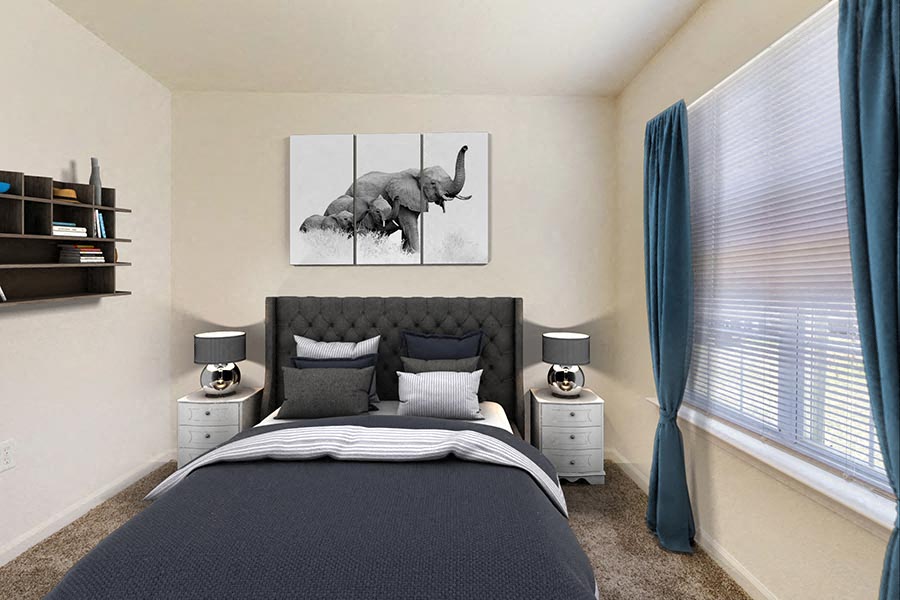 a bedroom with a bed and a painting of an elephant