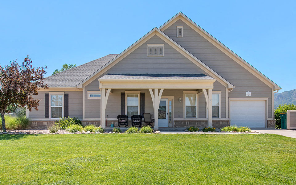 a house with a lawn in front of it