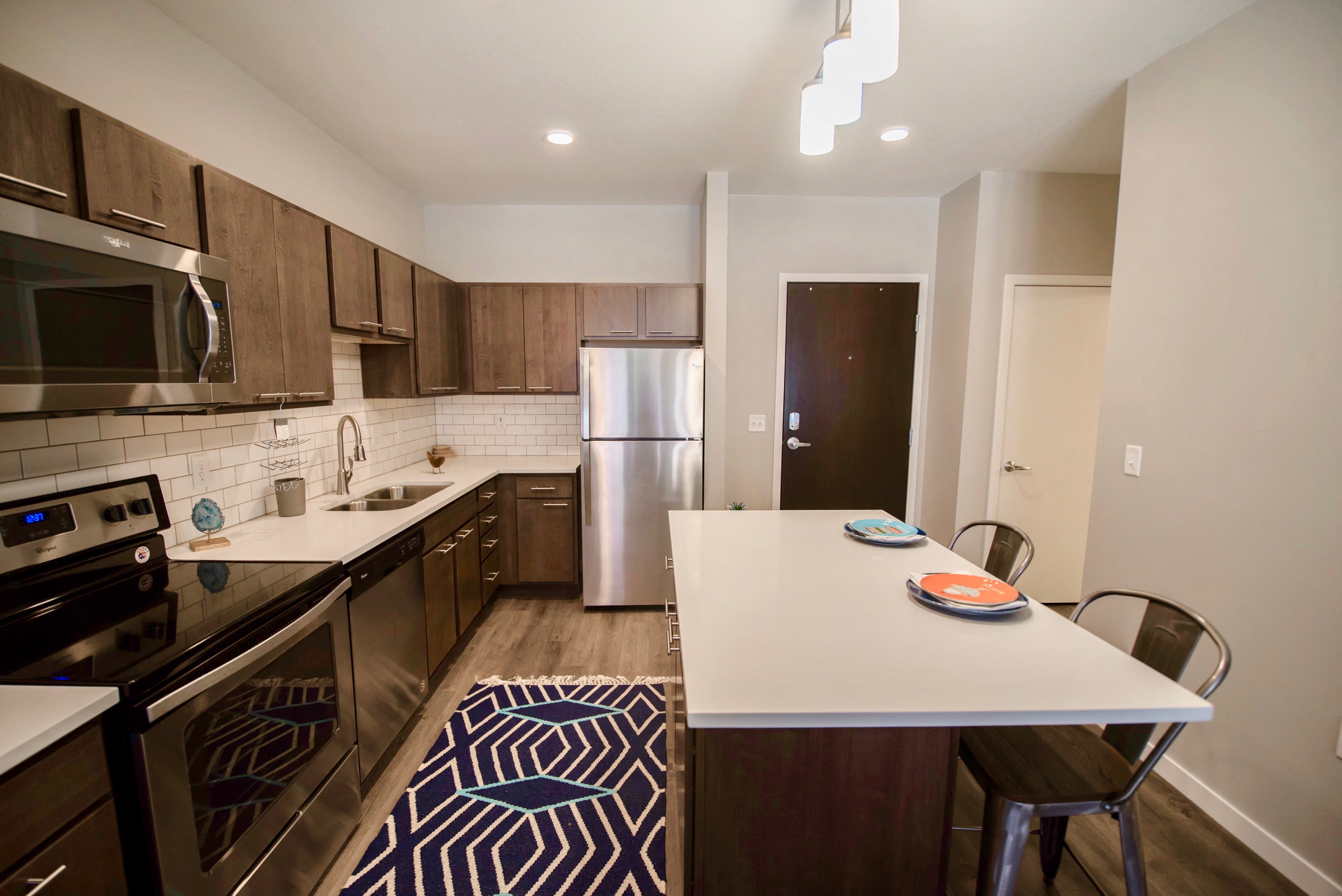 Kitchen at Confluence on 3rd Apartments in Downtown Des Moines