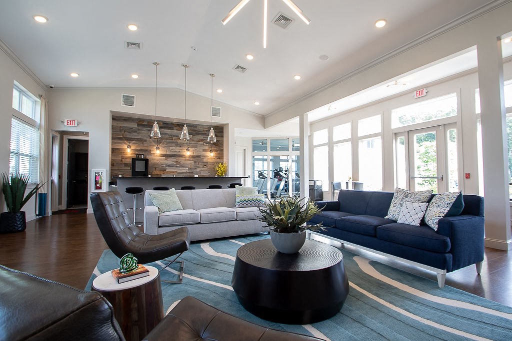 a living room with couches and a coffee table