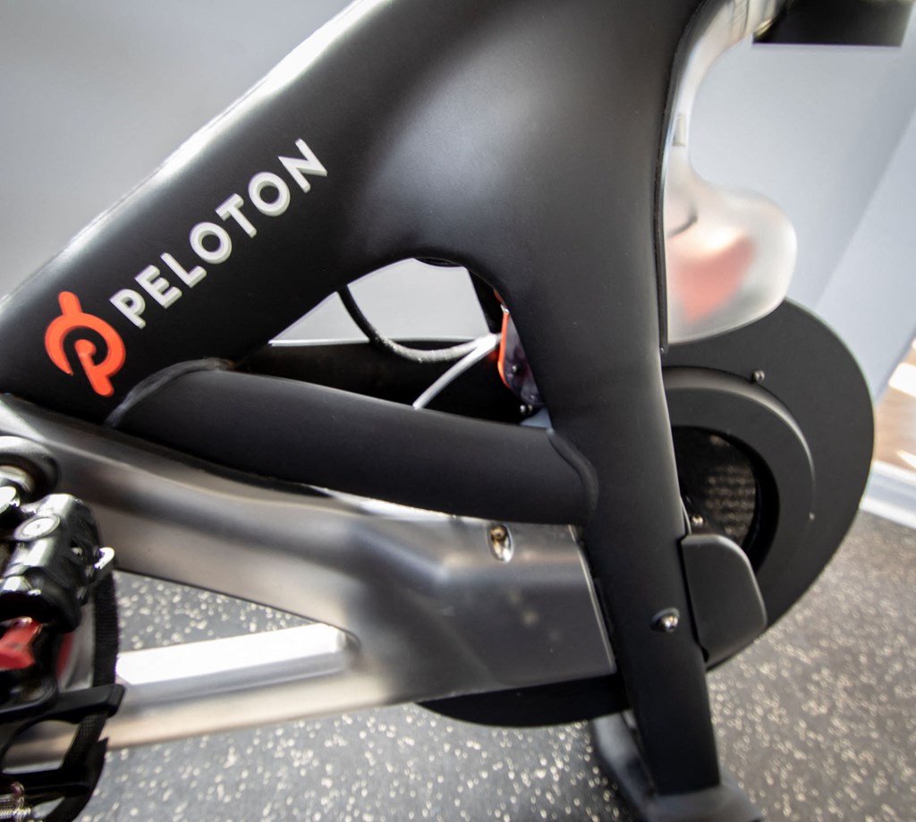 a stroller seat on a bicycle with a carbon seat protector