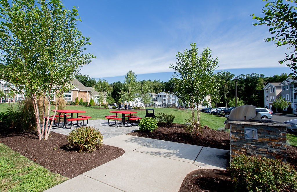 our apartments have a picnic area with benches and tables