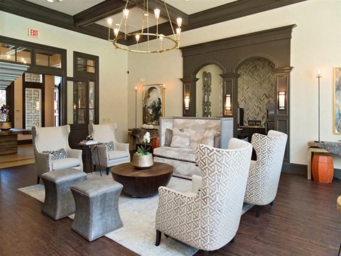 A living room with a patterned sofa and a coffee table.