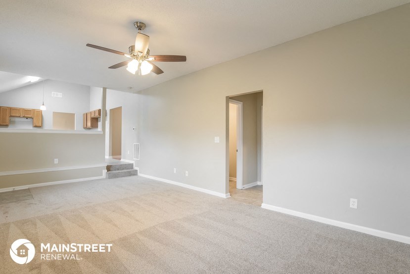 the living room and dining room are spacious and clean