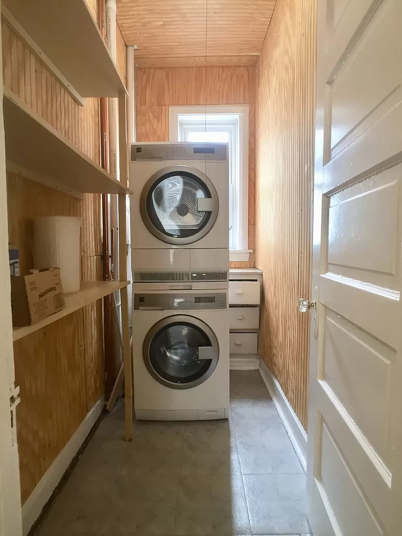 a laundry room with a washer and a dryer in it